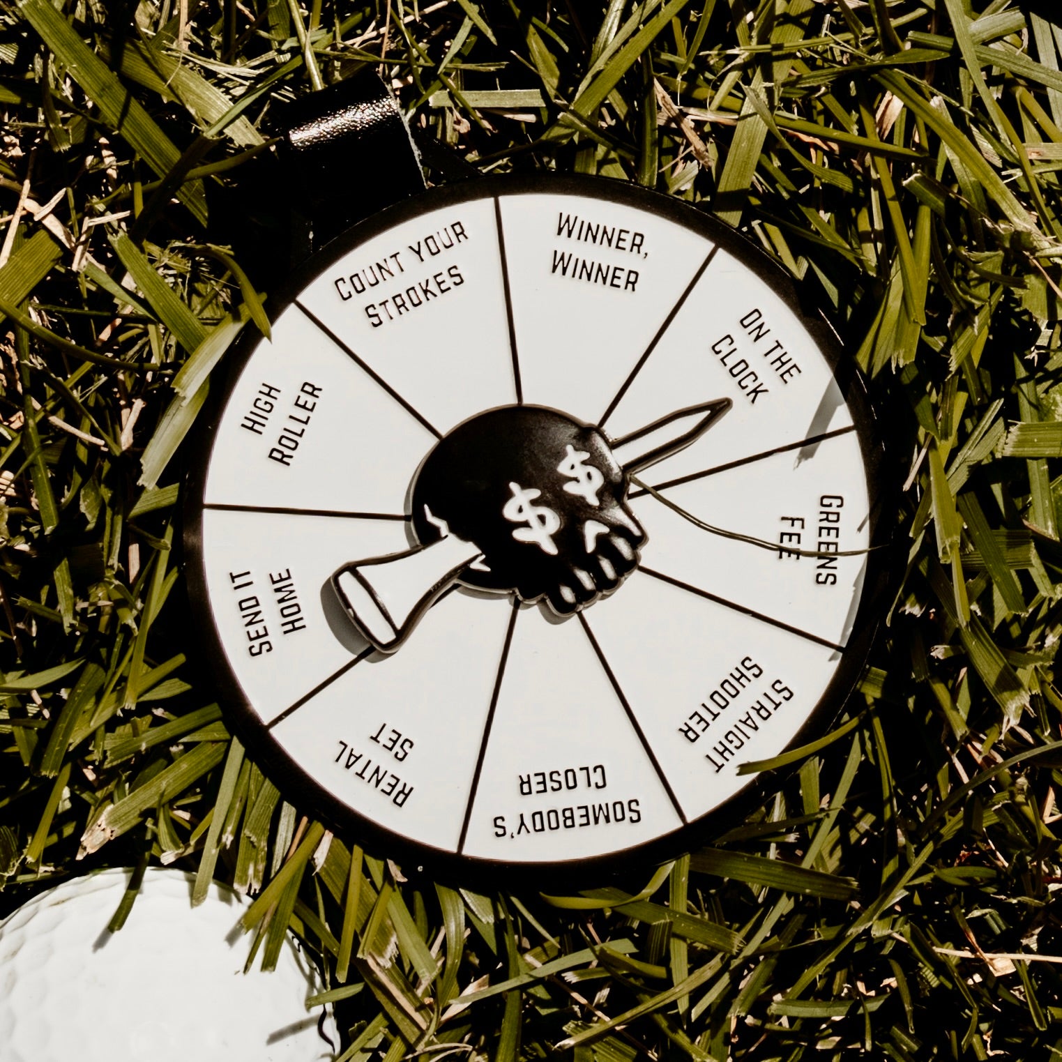 Chump Change bag tag spinner game — fun golf gambling game