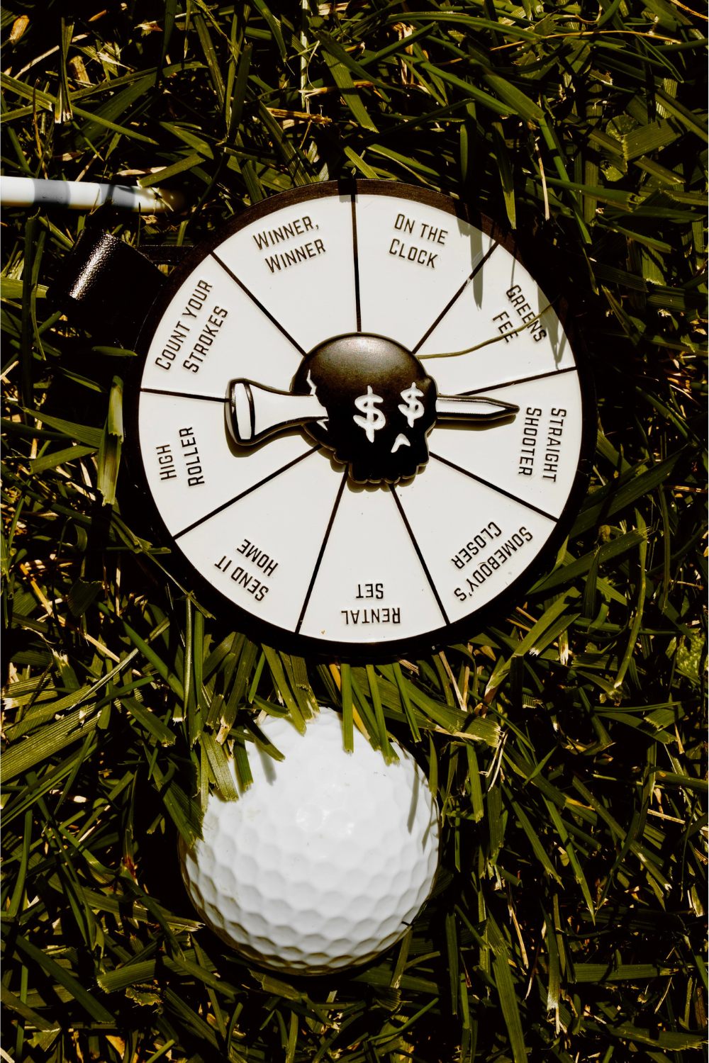 Chump Change bag tag spinner game — fun golf gambling game